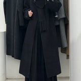 Soprabito di lana con un bottone e maniche lunghe