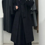 Soprabito di lana con un bottone e maniche lunghe