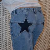 Jeans patchwork color-block con stelle Y2K